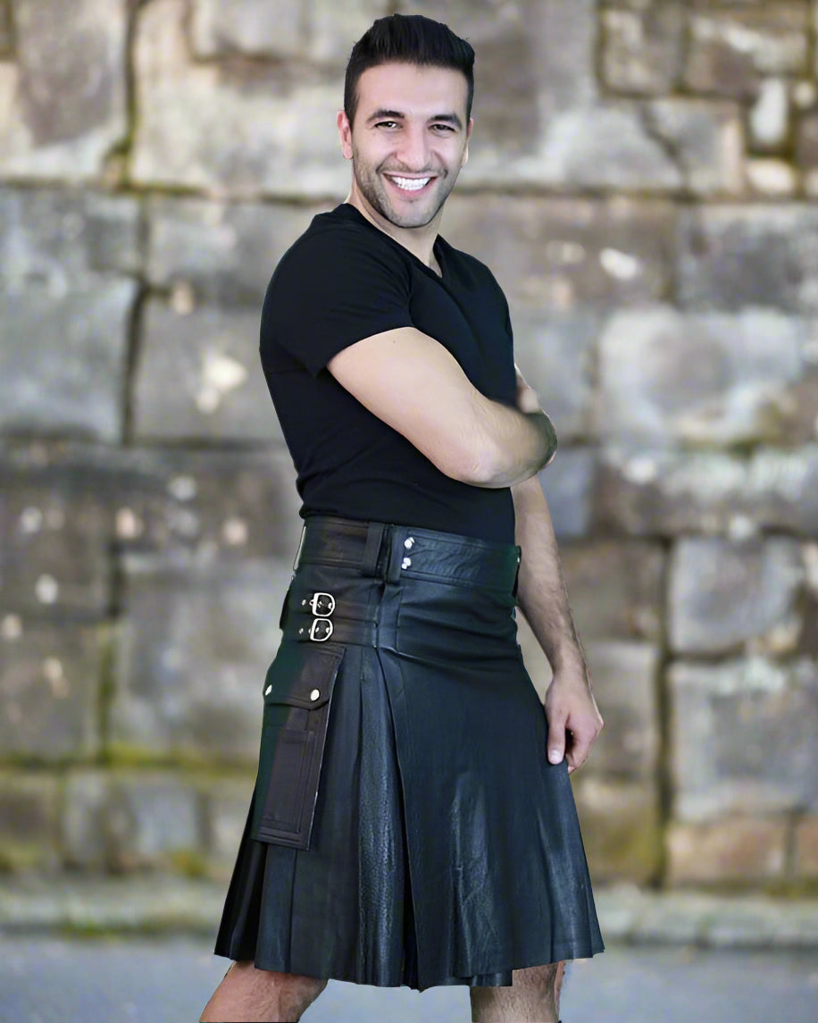 Man wearing a black leather kilt on a white background